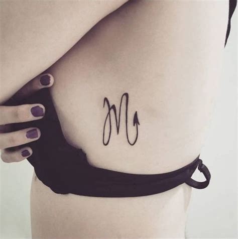 Memorable Minimalist Marigold Tattoos