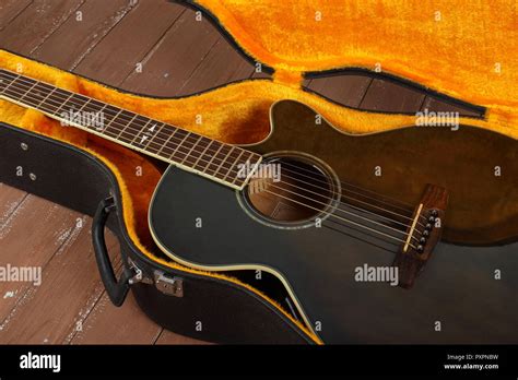 Musical Instrument Fragment Brown Cutaway Acoustic Guitar In Hard