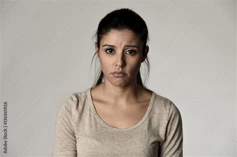 Young Beautiful Hispanic Sad Woman Serious And Concerned In Worried