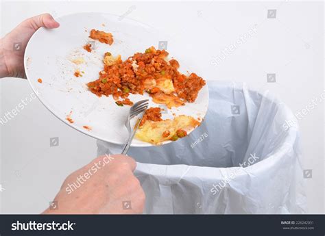 Scraping Food Waste Plate Into Garbage Stock Photo 226242031 Shutterstock