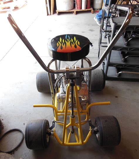 Yellow Barstool Racer With Ape Hangers Made Out Of Round Tubing Bar