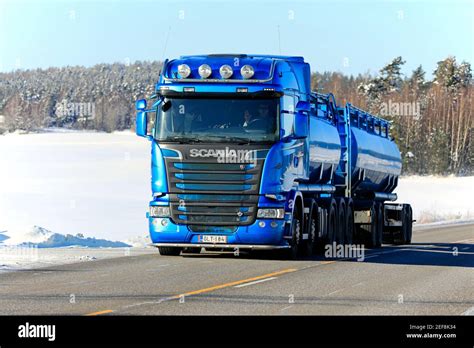 Blue Scania R580 tank truck Hänninen Group Oy delivers load along