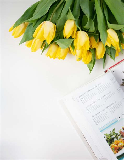 Yellow Tulips Bouquet Beside White Printer Paper Image Free Photo