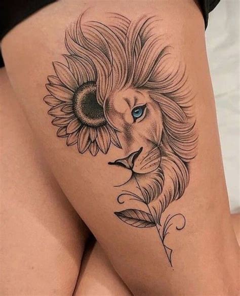 A Woman S Thigh With A Lion And Sunflower Tattoo On The Side Of Her Thighs