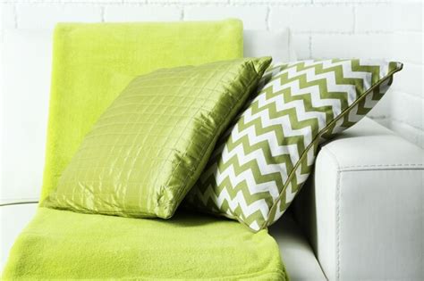 Premium Photo | Colorful pillows on sofa closeup