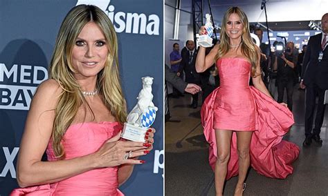 Heidi Klum Puts On A Leggy Display In A Hot Pink Mini Dress As She