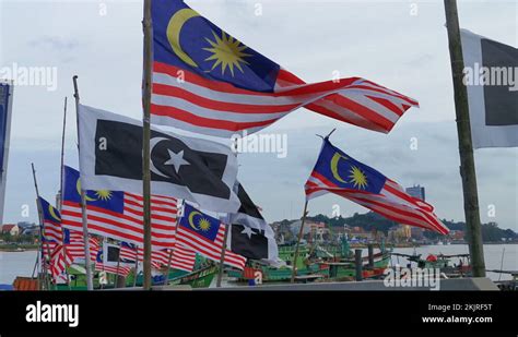 Static View Of Malaysian And Terengganu State Flags Fluttering On A