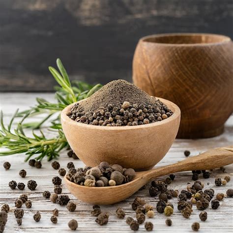 Premium Photo Organic Balck And White Pepper Piper Nigrum In Wood Bowl