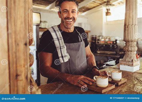 Male Barista Serving Coffee To Customers Stock Image Image Of Order