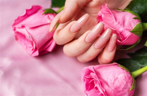 Female Hands With Pink Nail Design Hold Pink Roses Stock Photo By Olena