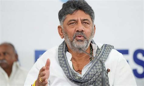 dk shivakumar urges state election commission  conduct street