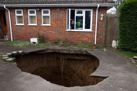 Dramatic Pictures Of Recent Sinkholes Reveal Hazards Lurking Below