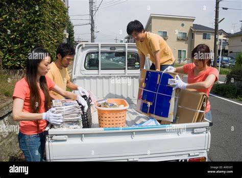 Young People Collecting Garbage Hi Res Stock Photography And Images Alamy