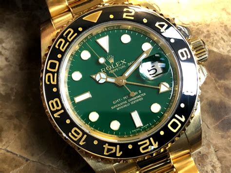 Rolex GMT Master II 18k Yellow Gold 116718 Green Dial Black Ceramic Box