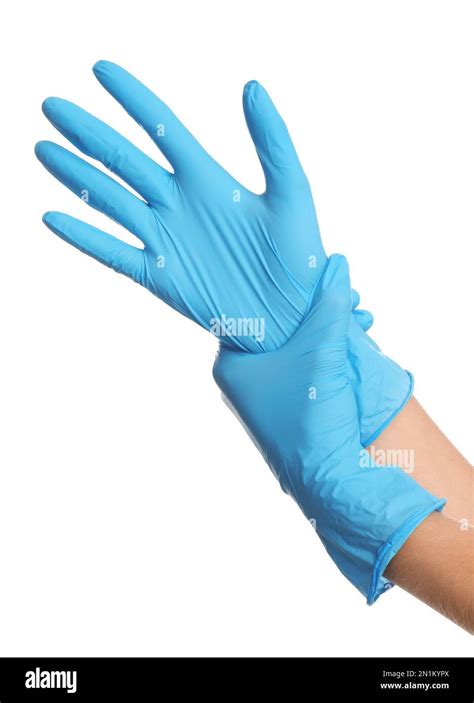 Doctor Wearing Medical Gloves On White Background Closeup Stock Photo