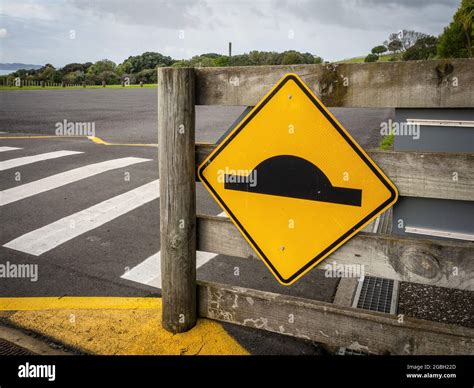 Road bump sign (W14-4). New Zealand road signs Stock Photo - Alamy