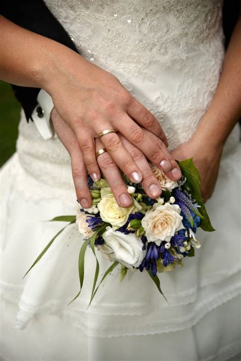 Wedding Couple Hand in Hand Stock Photo - Image of bridal, bride: 168303688