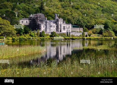 Kylemore Abbey On The Banks Of Pollacappul Lough In Connemara County