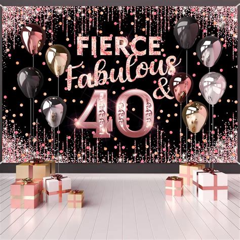 A Black And Gold 50th Birthday Party Backdrop With Balloons Presents