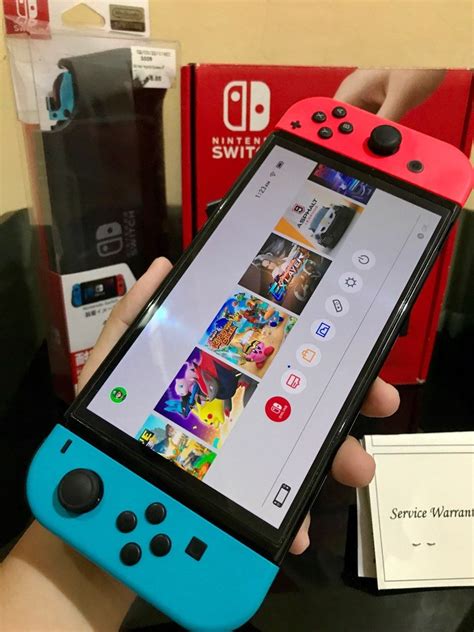 Nintendo switch Oled with games, Video Gaming, Video Game Consoles ...