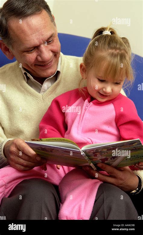 Grandparent Reading Bedtime Story Hi Res Stock Photography And Images