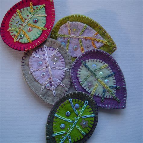 here's one I made earlier: New Felt Leaf Brooches