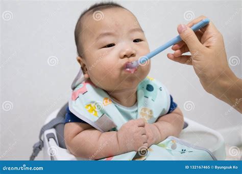 Korean Baby Eating a Baby Food Stock Image - Image of care, healthy ...