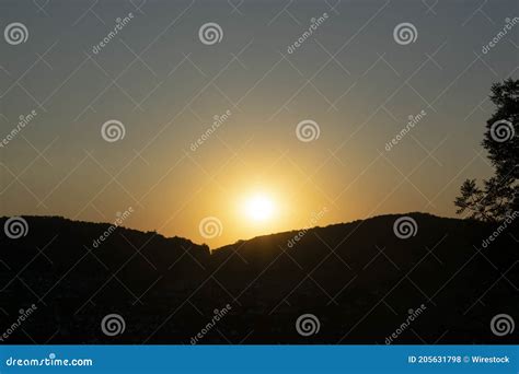 Beautiful Shot Of Mountains And A Beautiful Tree Silhouette At The