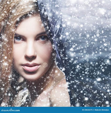 Portrait Of A Young Naked Woman On A Snowy Background Royalty Free