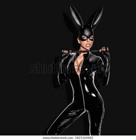 Sexy Girl In Halloween Costume Sexy Blonde Woman Posing In Latex Costume And Black Mask On