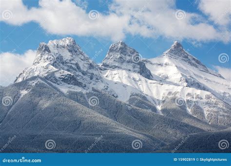 Three Sisters Mountain Range Stock Image - Image of sisters, rocky: 15902819