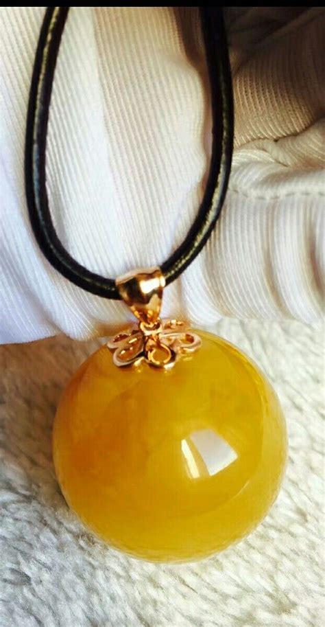 Pin on Янтарь in 2024 | Amber jewelry, Baltic amber jewelry, Gold ...