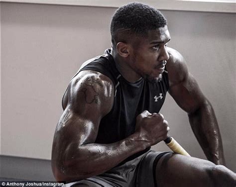 Anthony Joshua Shows Off His Ripped Biceps Daily Mail Online