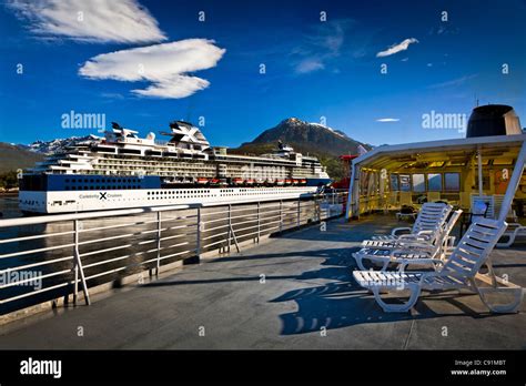 Alaska Marine Highway Ferry Moored Next To A Celebrity Cruises Cruise