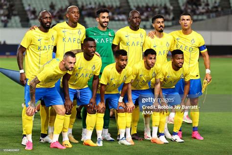 Cristiano Ronaldo Of Al Nassr Poses With His Team Mates For A Team