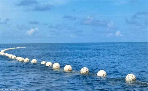 China Boluntaryo Raw Tinanggal Ang Floating Barrier Sa Scarborough Shoal