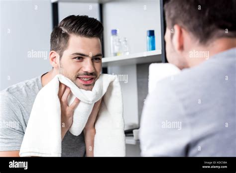 Man Wiping Face Shirt Hi Res Stock Photography And Images Alamy