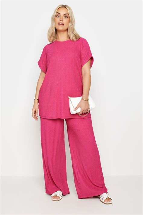 Yours Plus Size Pink Crinkle Plisse Wide Leg Trousers Yours Clothing