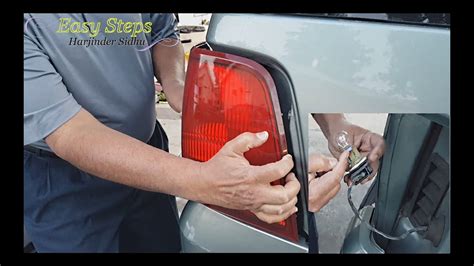 how to fix left back brake light bulb