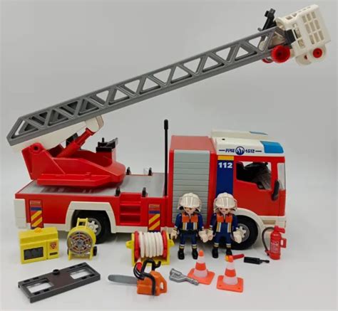 PLAYMOBIL CAMION DE pompiers Grande échelle 4820 2009 avec 2 pompiers