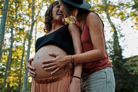 Premium Photo Closeup Of A Pregnant Lesbian Couple Doing A Photoshoot