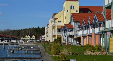 Das Hafendorf Rheinsberg Ferienhaus Urlaub Mit Boot Am See