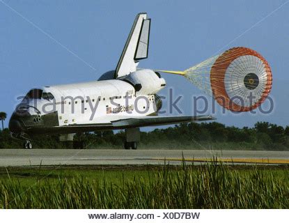 With Its Drag Chute Deployed Space Shuttle Discovery Slows To A Stop