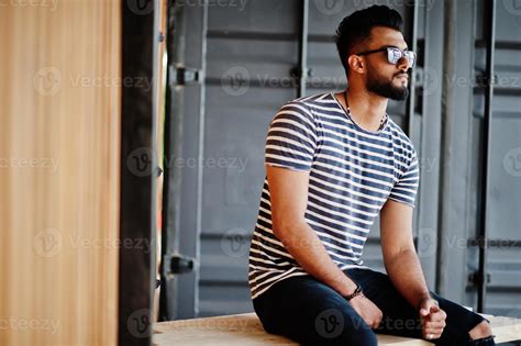 Handsome Tall Arabian Beard Man Model At Stripped Shirt Posed Outdoor