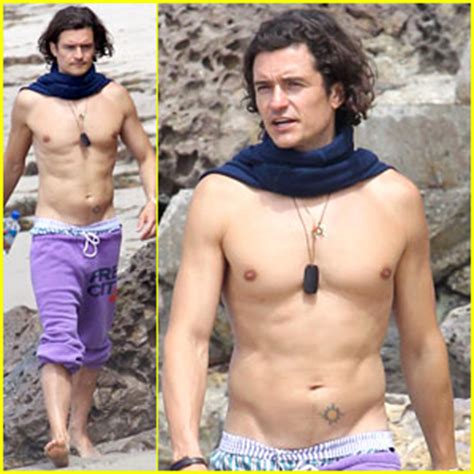 Orlando Bloom Goes Shirtless Wears A Scarf At The Beach Orlando