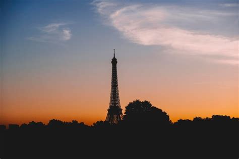 Premium Photo | Silhouette of eiffel tower at sunset