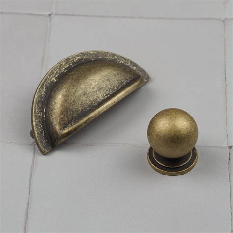 Antique Brass 76mm Hole Centred Cabinet Cup Handle And Matching Knob Handle And Home