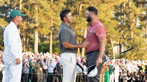 Masters Champion Jon Rahm Is Greeted By Brooks Koepka After The Final