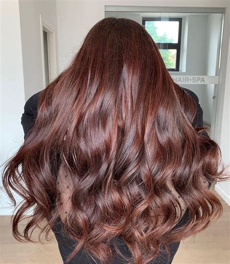 Strawberry Brunette Is The New Way To Add A Hint Of Red To Brown Hair