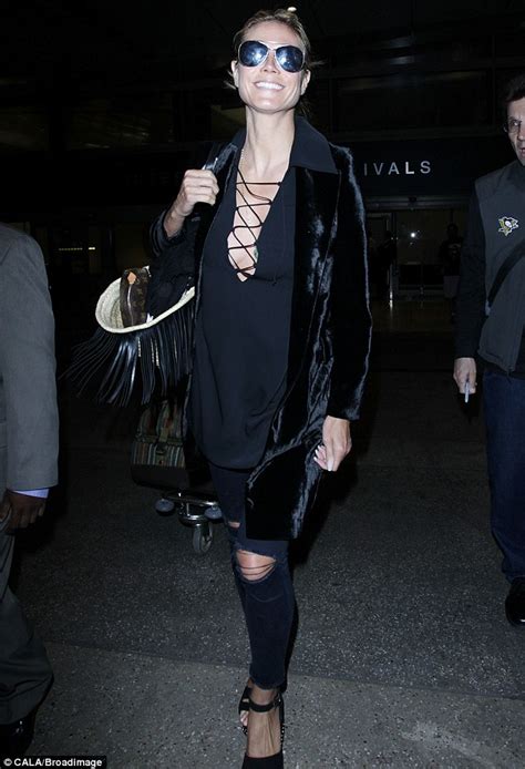 Heidi Klum Flashes Plenty Of Sideboob As She Goes Braless In Lace Up